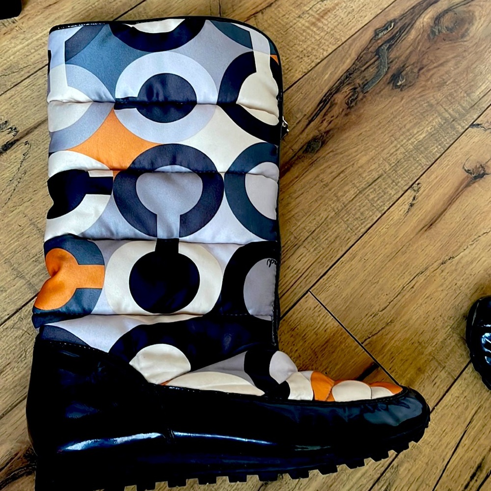 Barely worn,  Coach size 9 women’s snow boots.